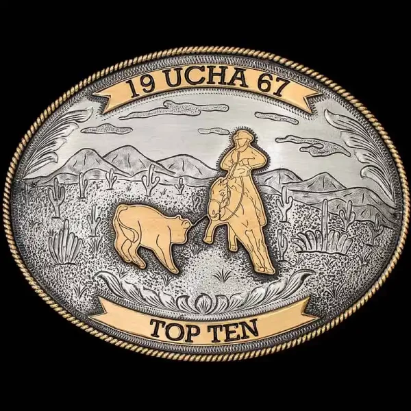 "Our beautiful Philipsburg Buckle features a beautiful mountain-scene that'll make you feel like you stepped right into a Wild West movie. This buckle is crafted on a German Silver base. The Jeweler's Bronze rope edge & banners add to the traditi